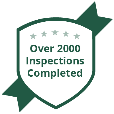 Badge saying over 2000 inspections completed